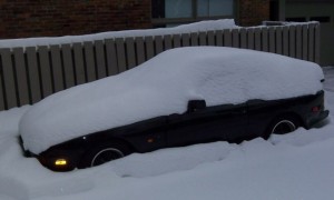 snow covered porsche 944