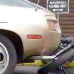 porsche 928 hits bike